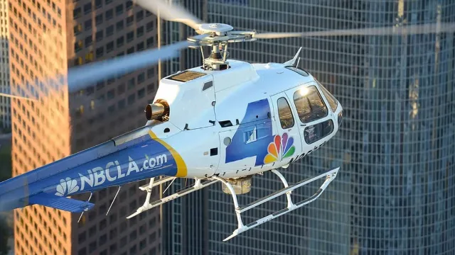 Journalist and pilot killed as news helicopter crashes during live report