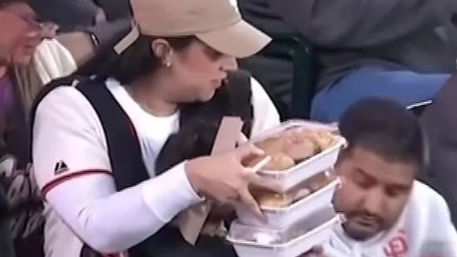 “Mom of the year” responds as viral clip with husband at baseball game leads to death threats