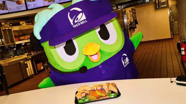Taco Bell is giving Duolingo’s mascot its own sauce in Taco Day collab
