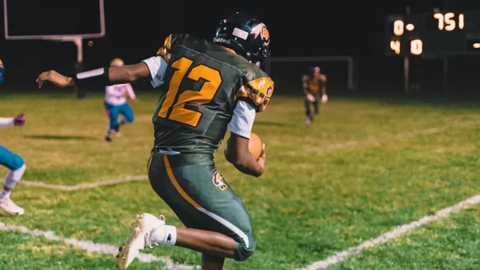 “Upset” man warned by police after kicking 9-year-old player during football game
